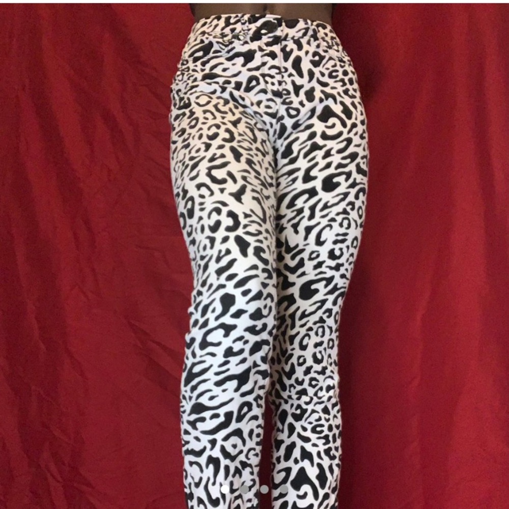Kourtney Kardashian leopard print jeans.